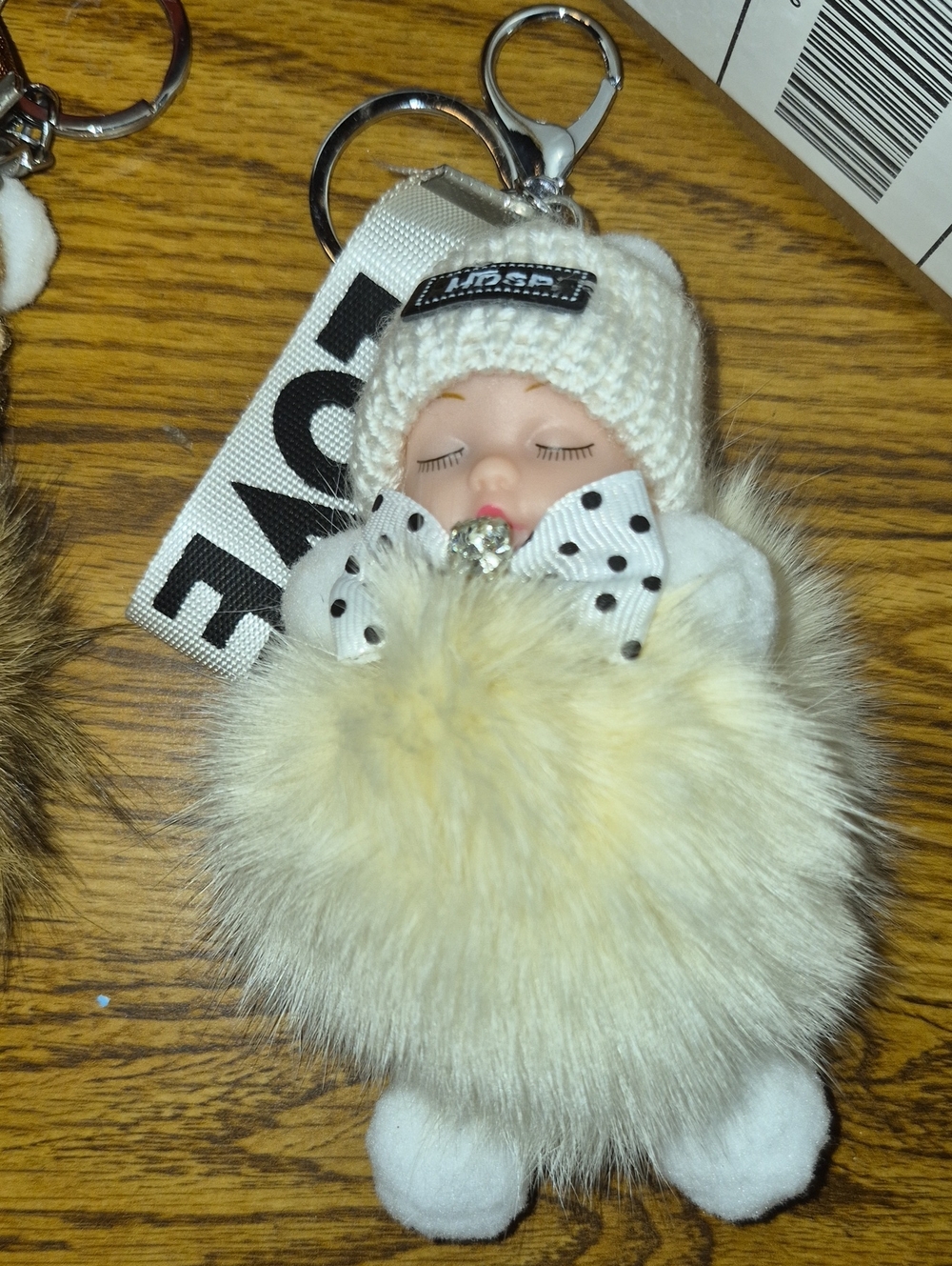 Love Plush Doll Keychain with White Knit Hat and Cream Fur Pom